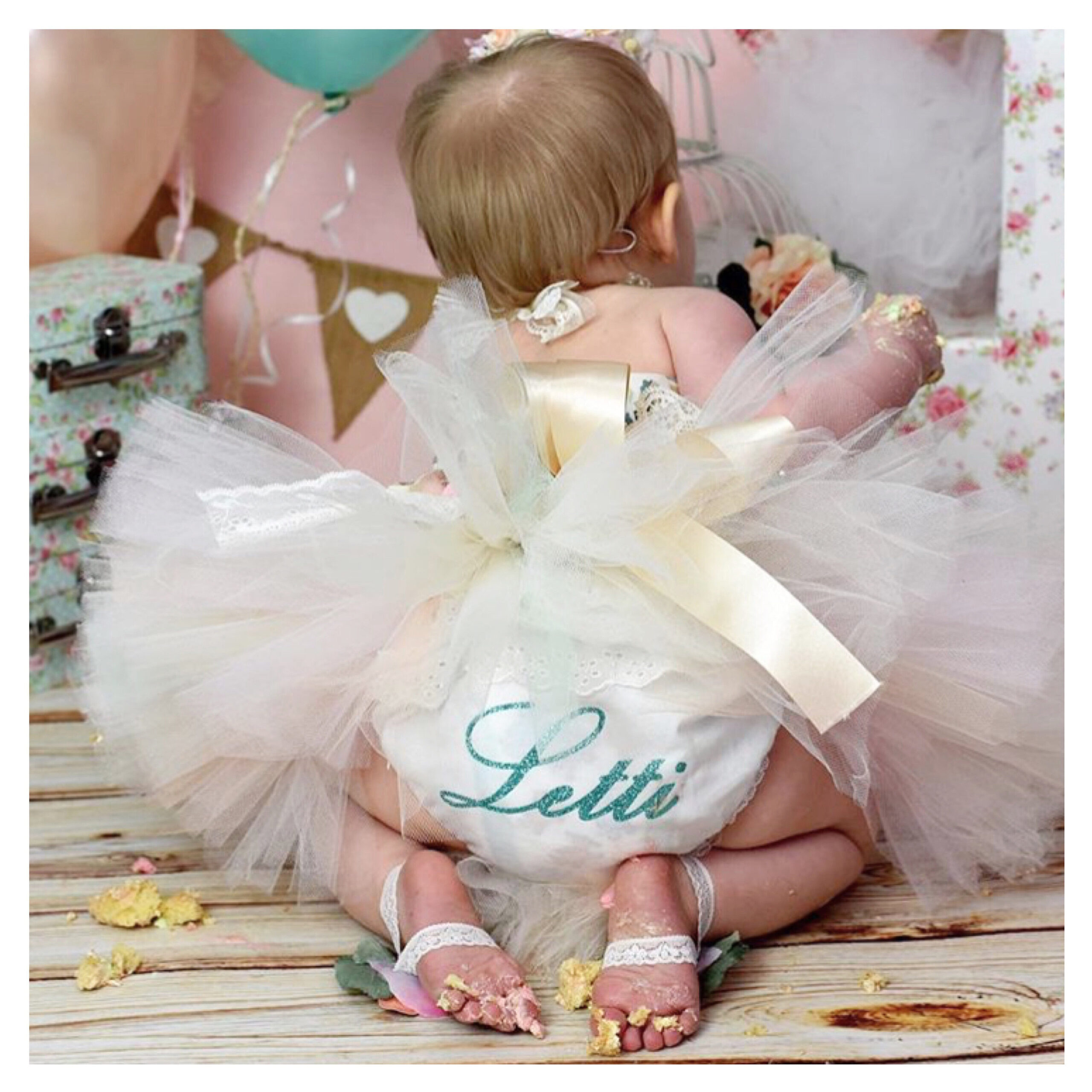 https://www.tailored-with-love.com/wp-content/uploads/2021/02/personalised-frilly-lace-girls-knickers-or-nappy-cover-for-wedding-flower-girl-1st-birthday-cake-smash-gold-glitter-baby-or-toddler-60376415-scaled.jpg